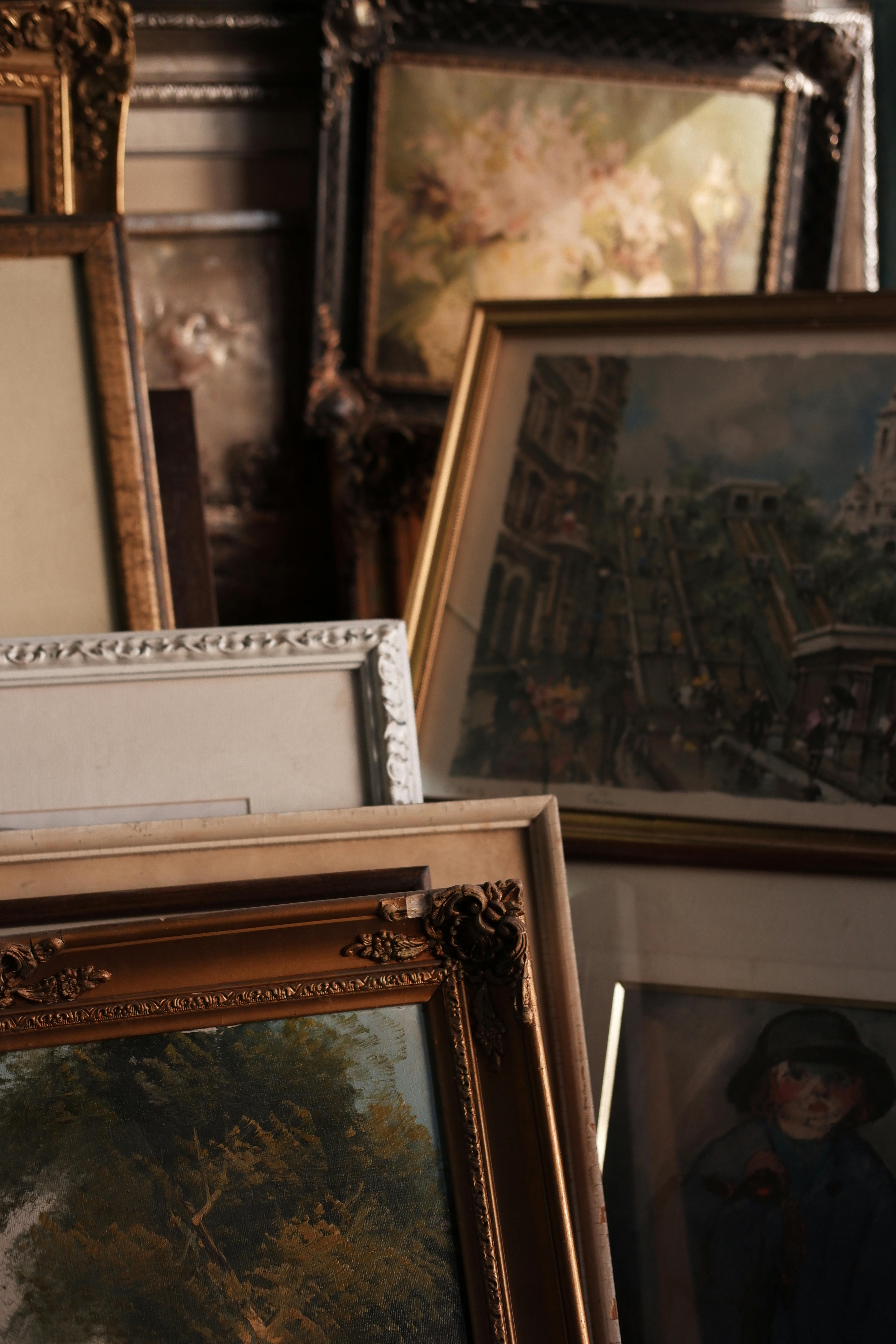 Inside the Model Home Art shop with framed art displays